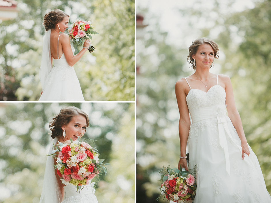 A bride shows off her beautiful bouqet of coral roses.