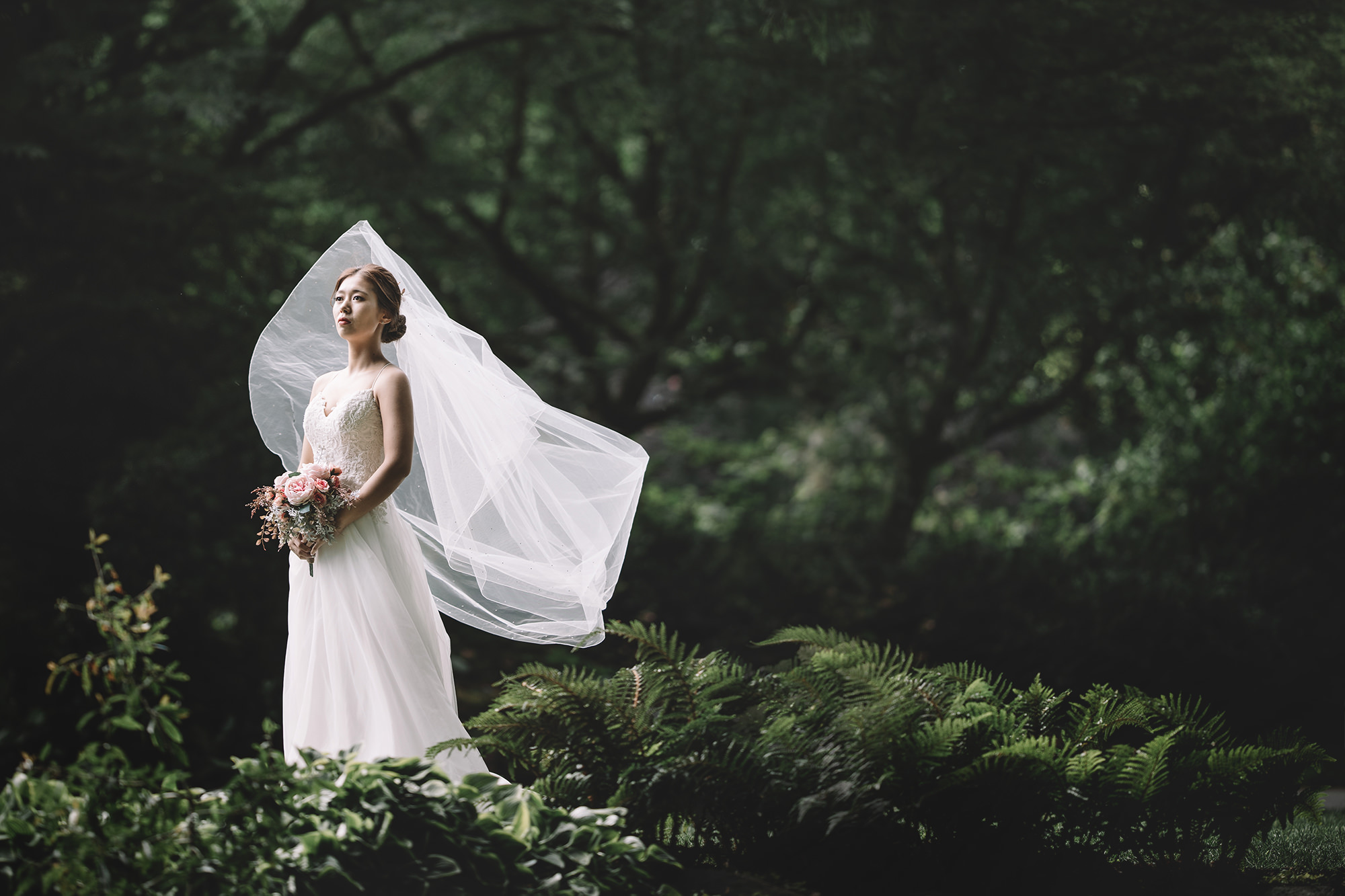 Wind blows bride's veil