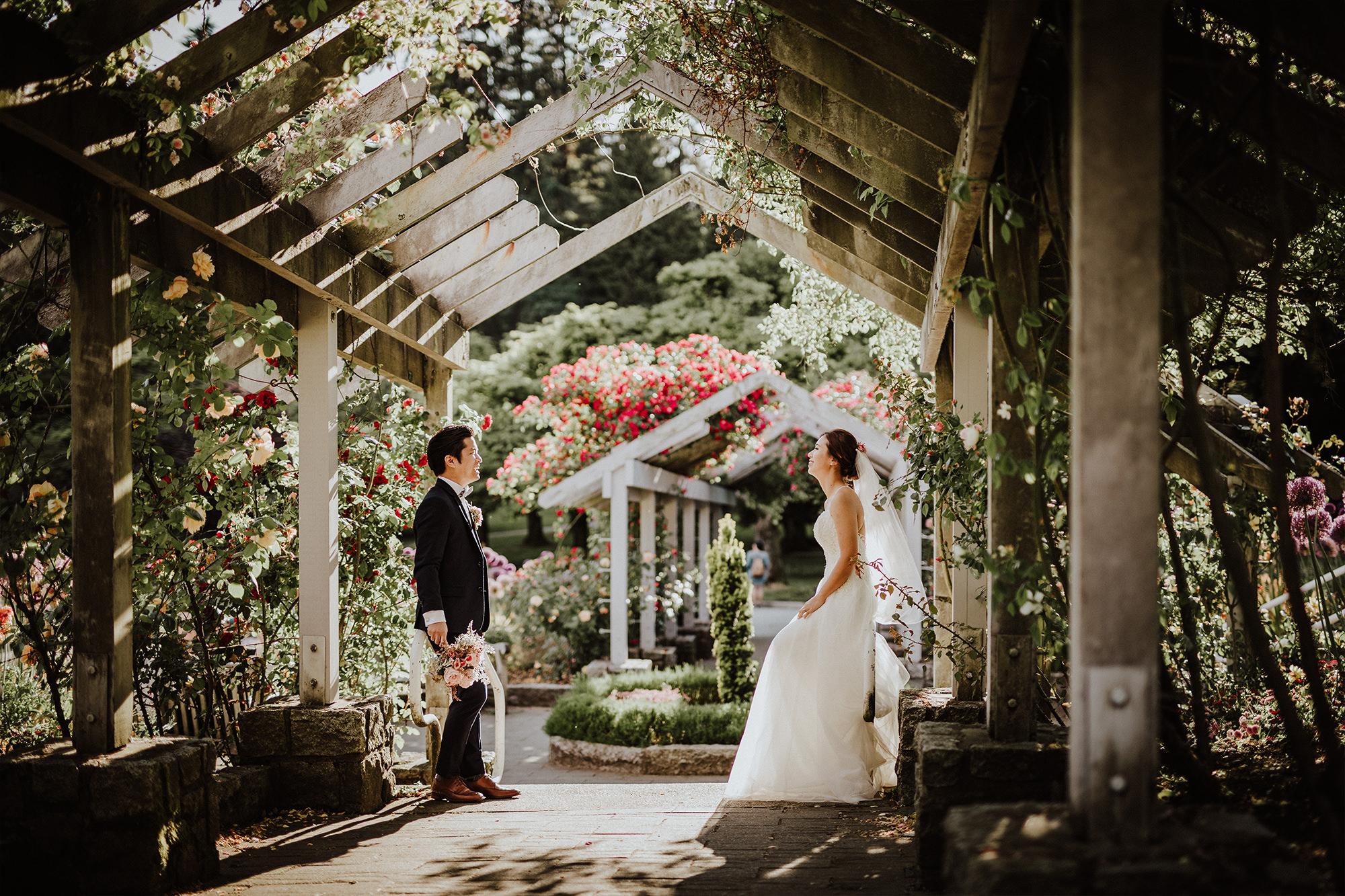 Bride and groom in the Stanley Park Rose garden