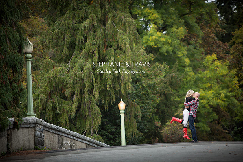Romantic couple on stone bridge in Stanley Park